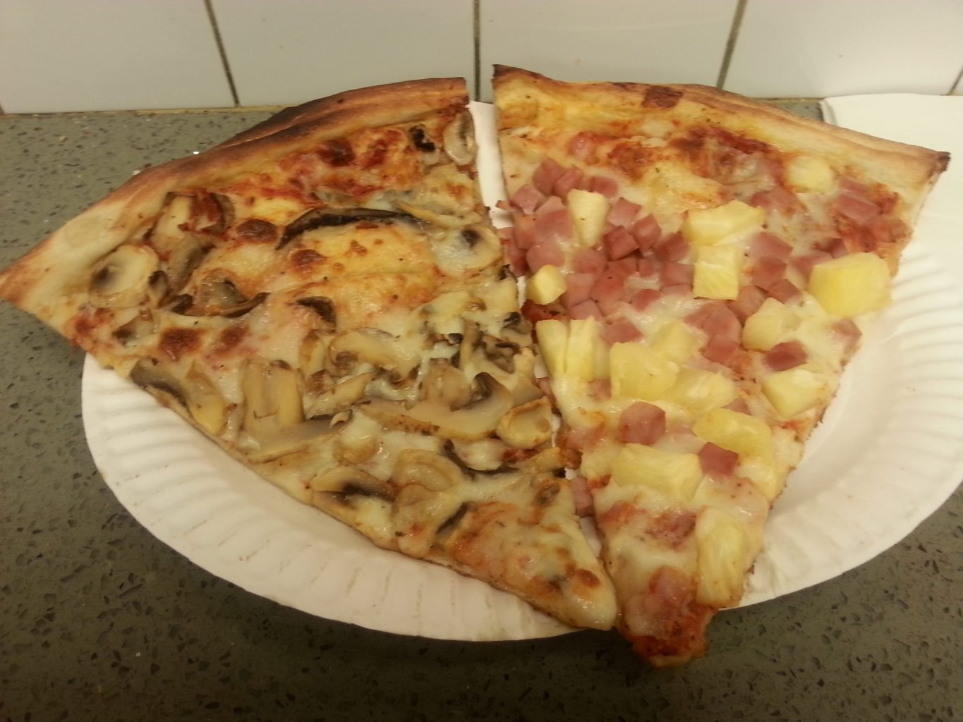 2 Bros Pizza Mushroom and Hawaiin Slice